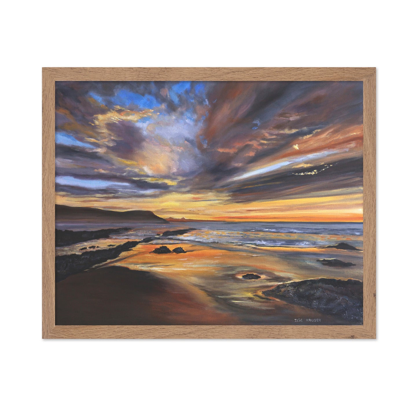 Serene Sunset Over A Rocky Beach