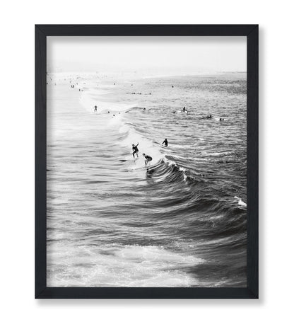 Surfers Riding Waves