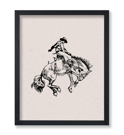 Cowboy Riding A Wild Horse