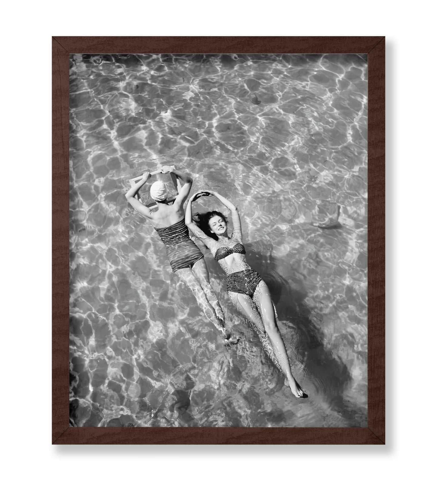 Swimsuit Models Float in Water
