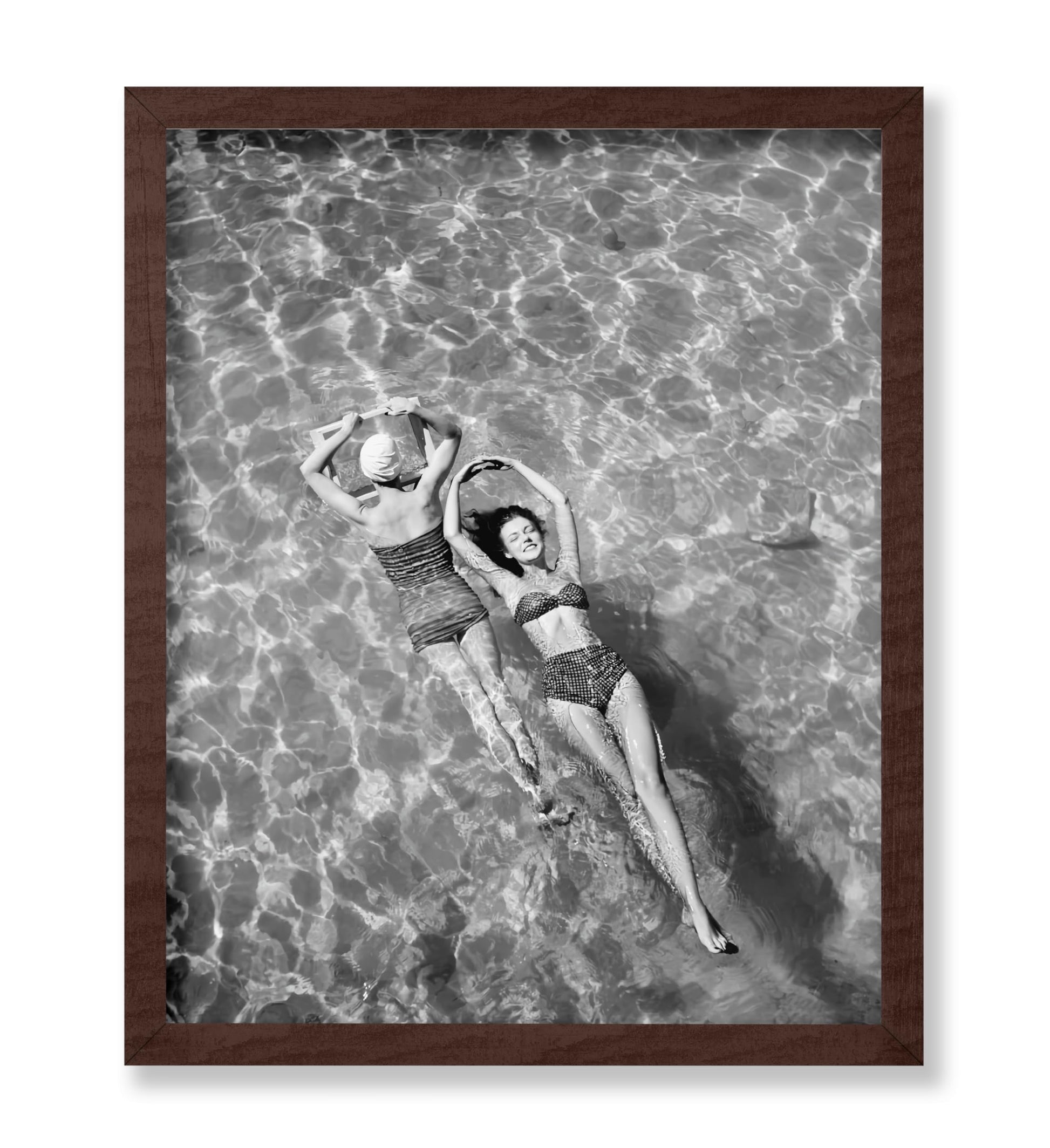 Swimsuit Models Float in Water