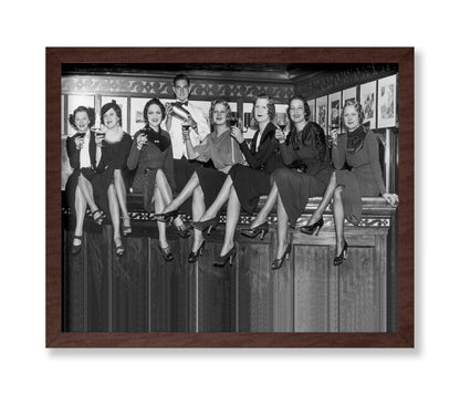 Women Sitting on A Bar