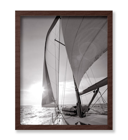 Yacht Sailing Towards Sunset