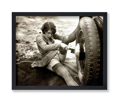 Woman Changing Tires