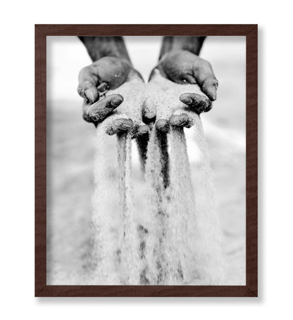 Sand Slipping Through Fingers