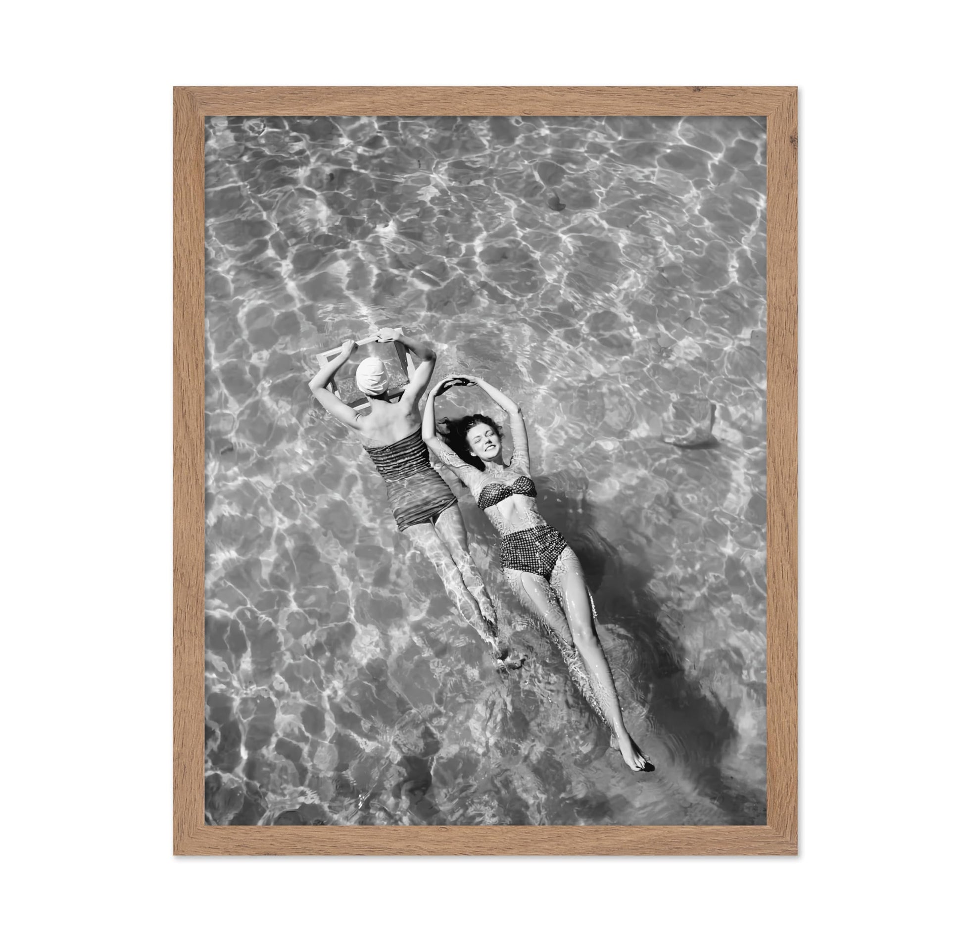 Swimsuit Models Float in Water