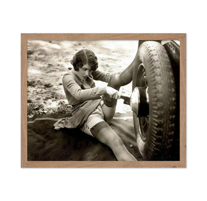 Woman Changing Tires