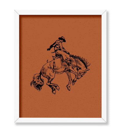 Brown Cowboy Riding A Wild Horse
