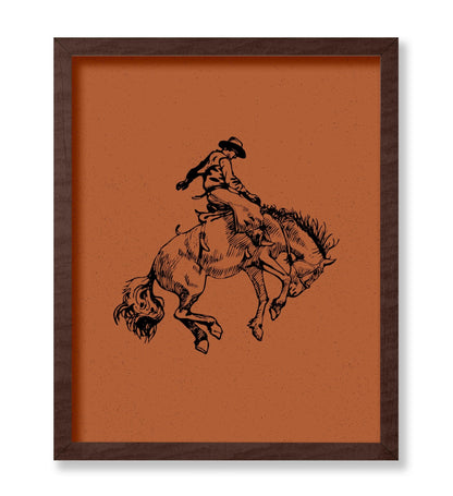 Brown Cowboy Riding A Wild Horse