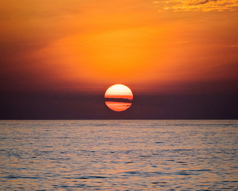 Sun Setting Over Ocean