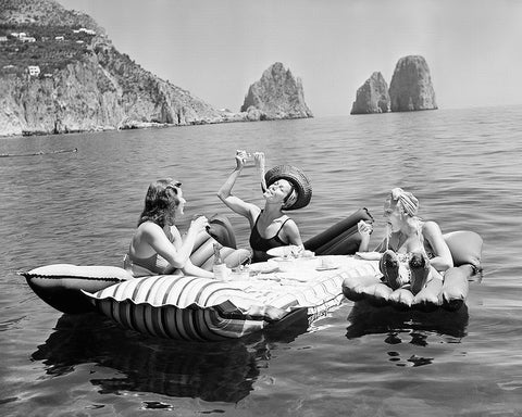 Women Eating Spaghetti on Lake