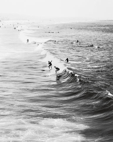 Surfers Riding Waves