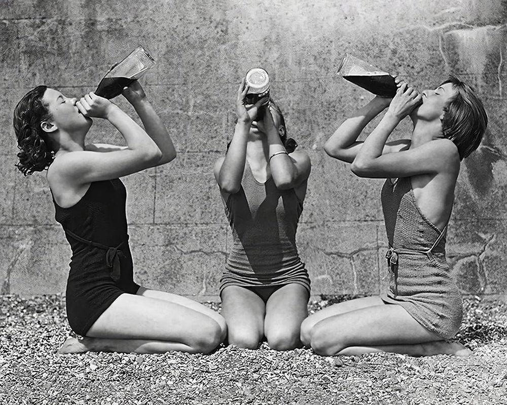 Women Drinking Wine From Bottle in Swimsuits