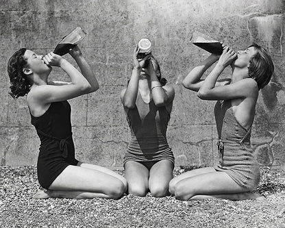 Women Drinking Wine From Bottle in Swimsuits