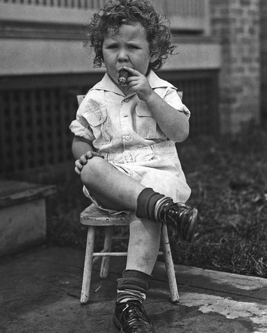 Young Boy Smoking Cigar