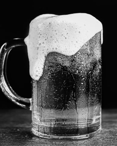 Beer with Foam in Mug