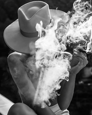 Woman in Hat Smoking