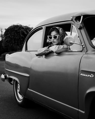 Woman in Classic Car
