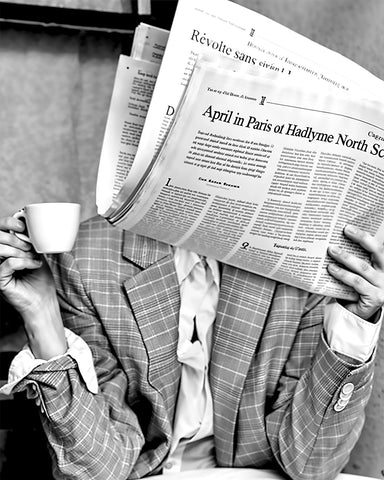 Woman Reading Newspaper