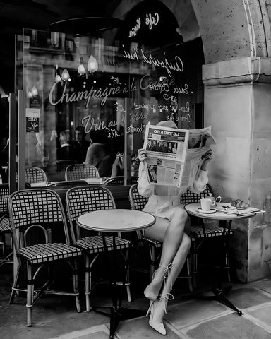Woman Reading Newspaper in Paris
