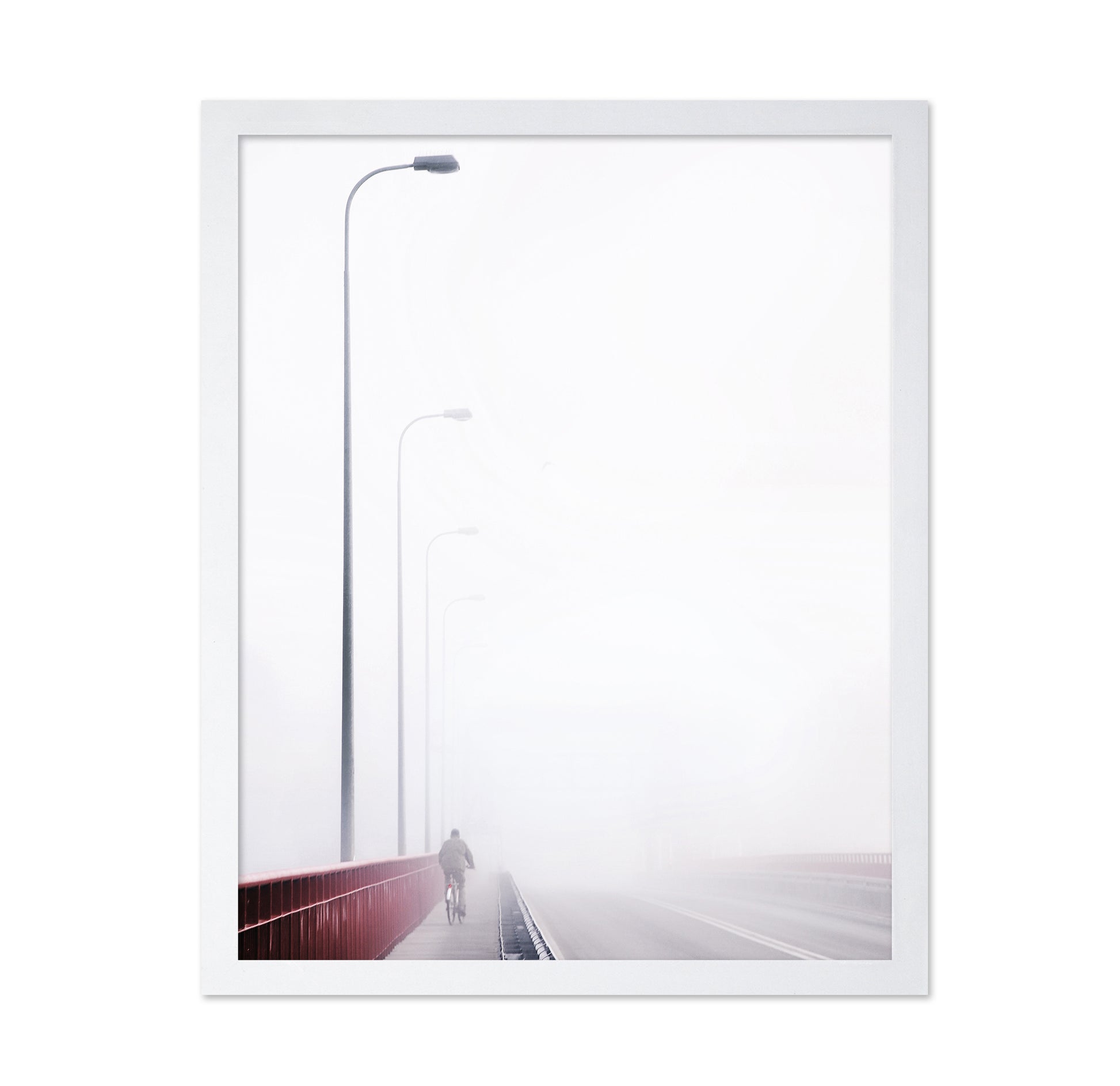 Cyclist on a Foggy Bridge
