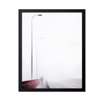 Cyclist on a Foggy Bridge