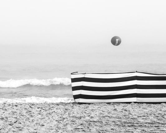 Monochrome Beach Scene with Ball