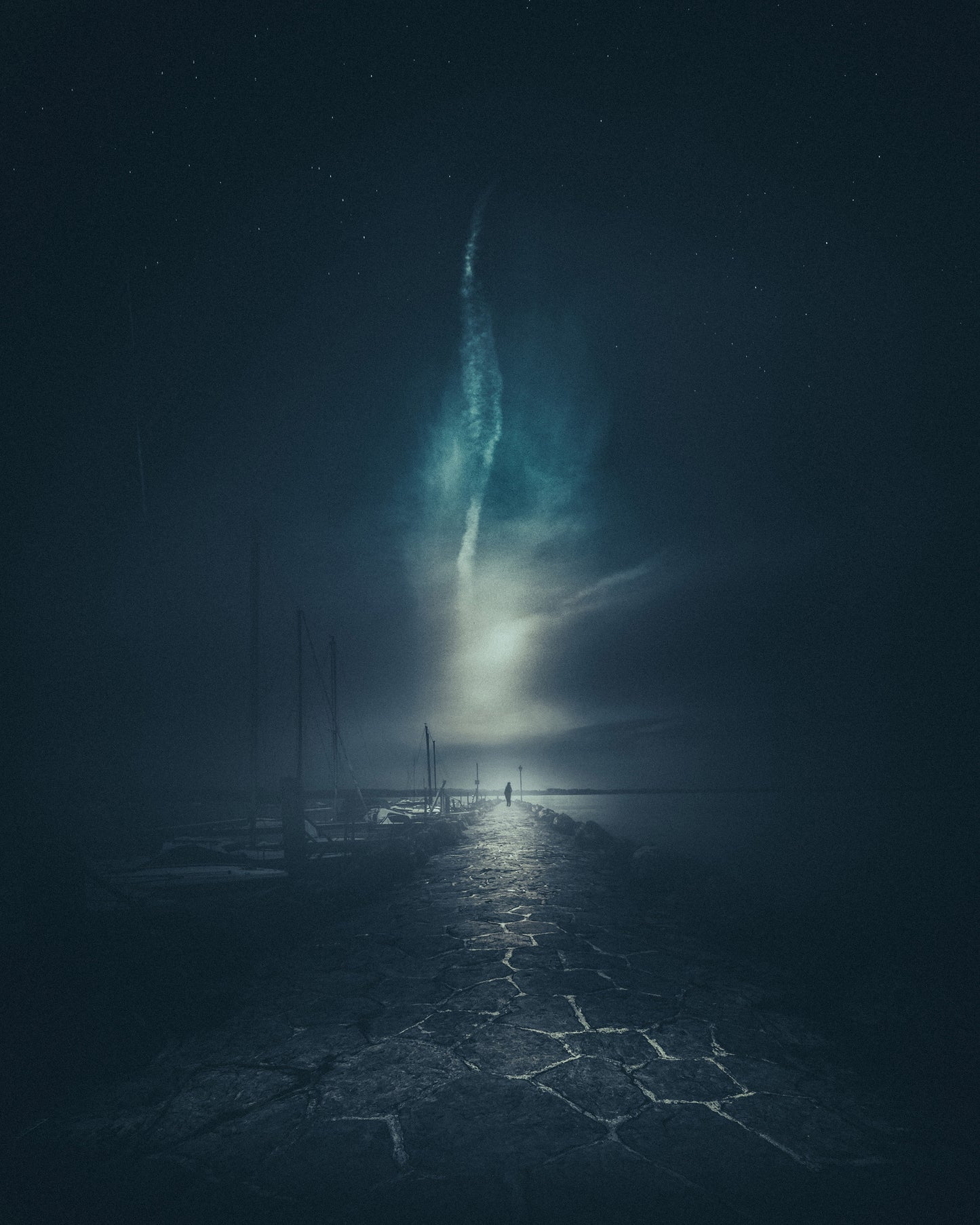 Walking Along a Stone Pier at Night