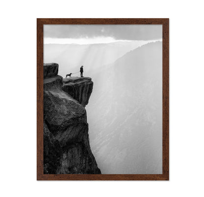 Woman And Dog On Cliff