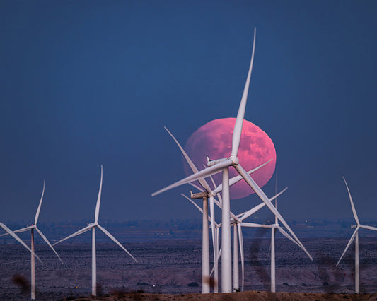 Blood Moon Rising Over a Wind Farm