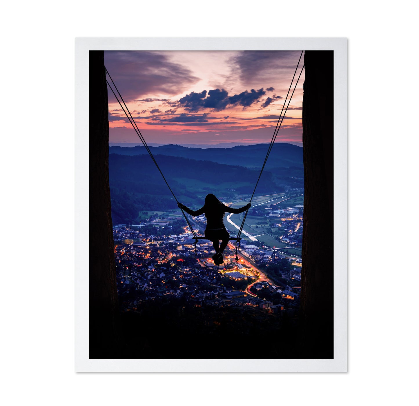 Silhouette Of A Woman On A Swing