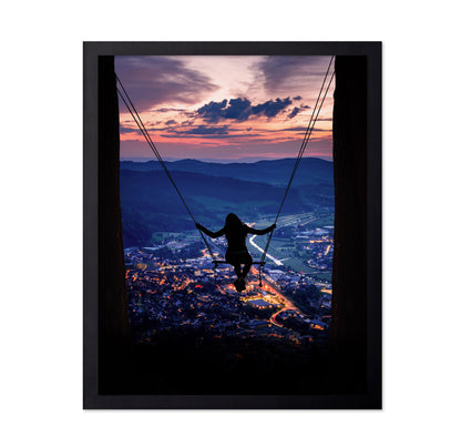 Silhouette Of A Woman On A Swing