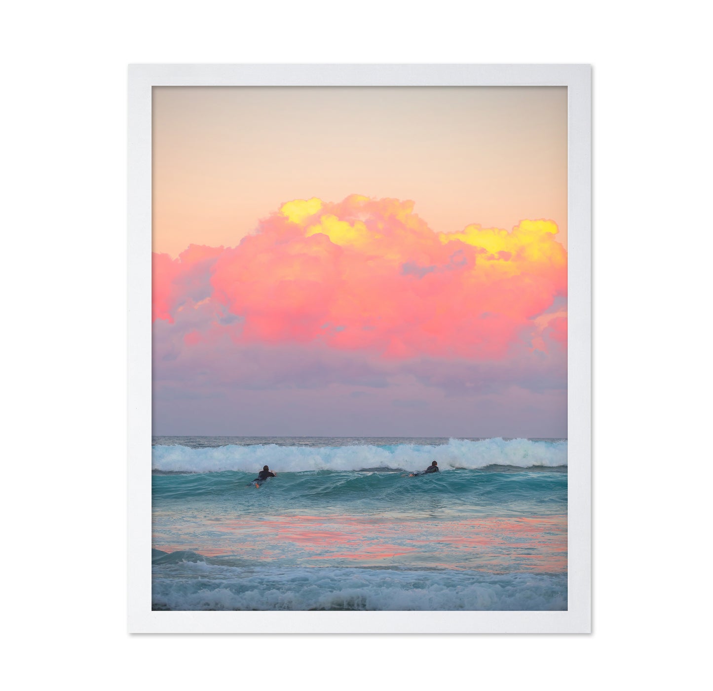 Surfers Ride The Waves At Sunset