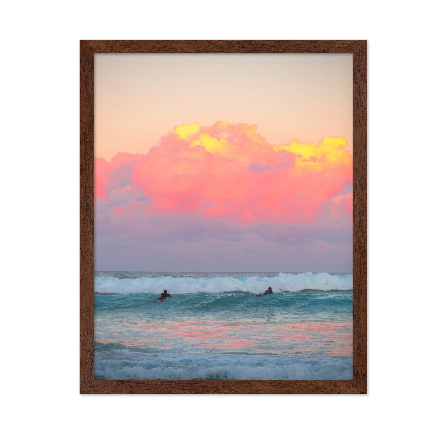 Surfers Ride The Waves At Sunset