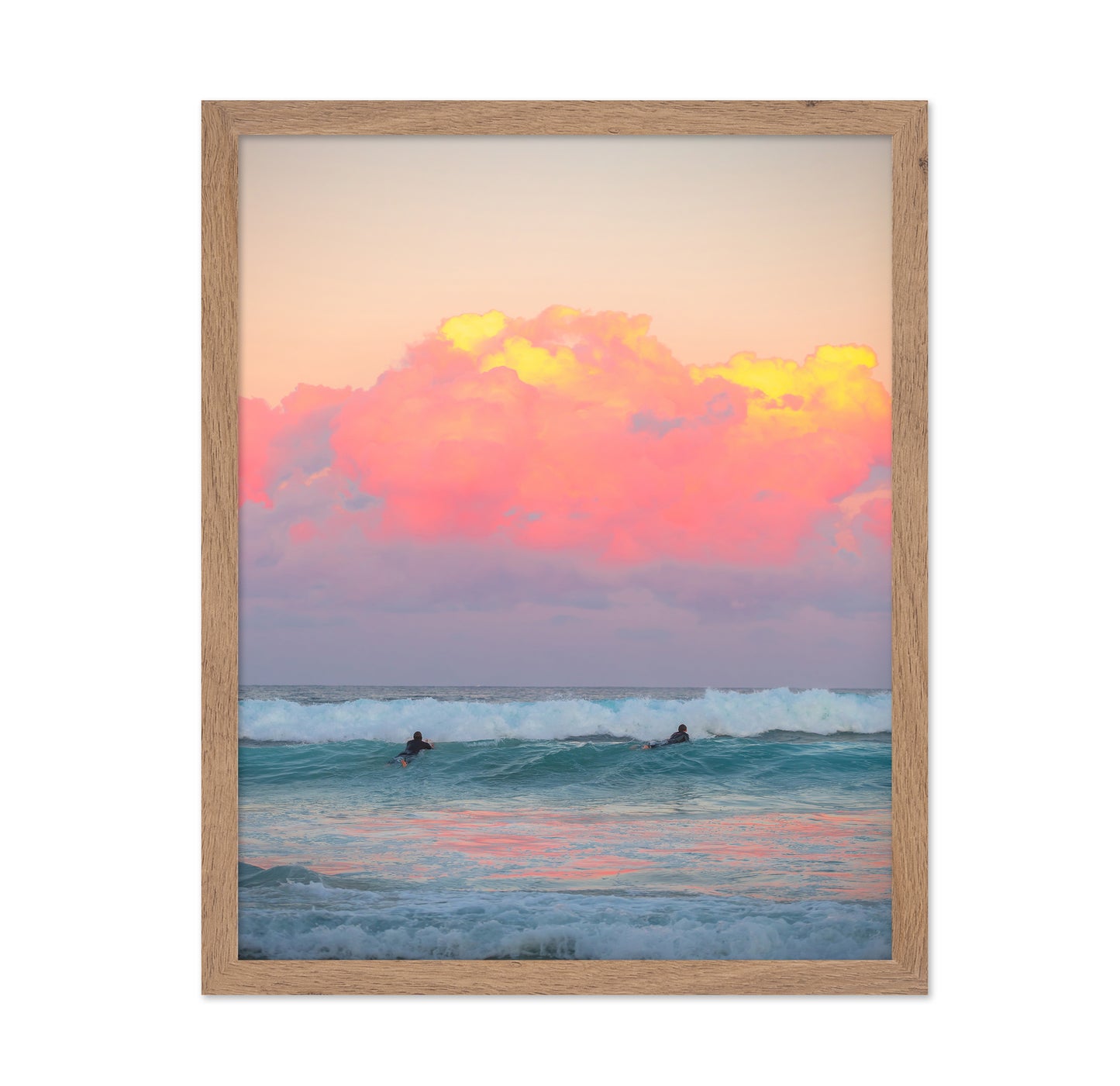 Surfers Ride The Waves At Sunset