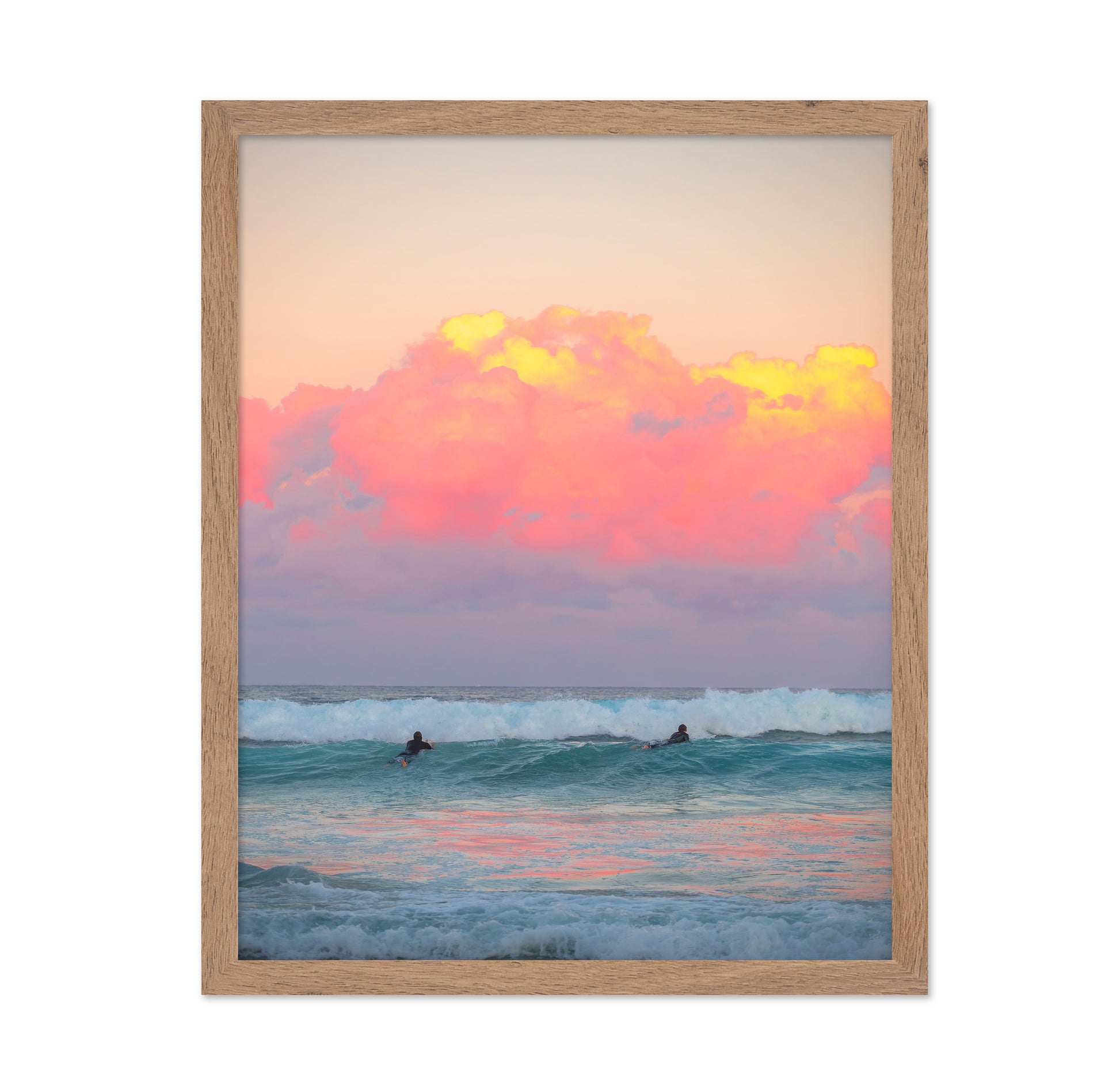 Surfers Ride The Waves At Sunset
