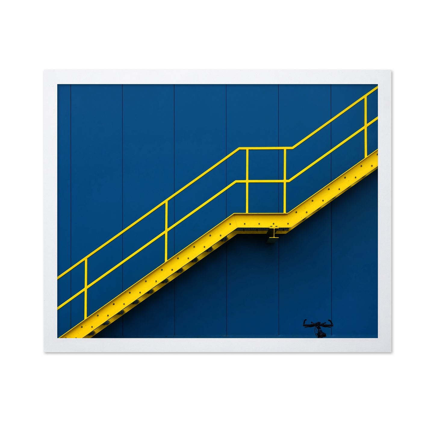 Yellow Metal Staircase Against A Blue