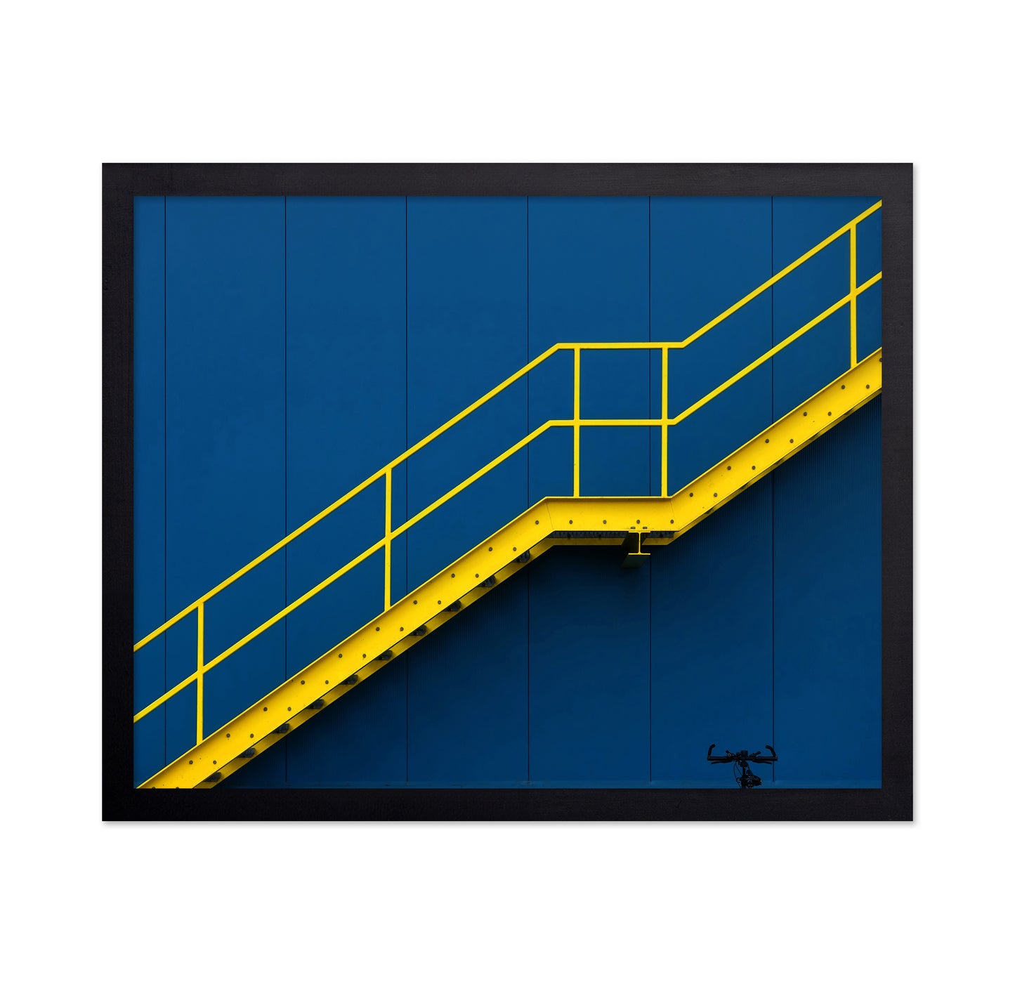 Yellow Metal Staircase Against A Blue