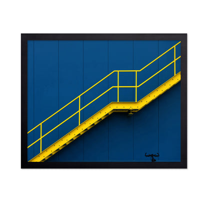 Yellow Metal Staircase Against A Blue
