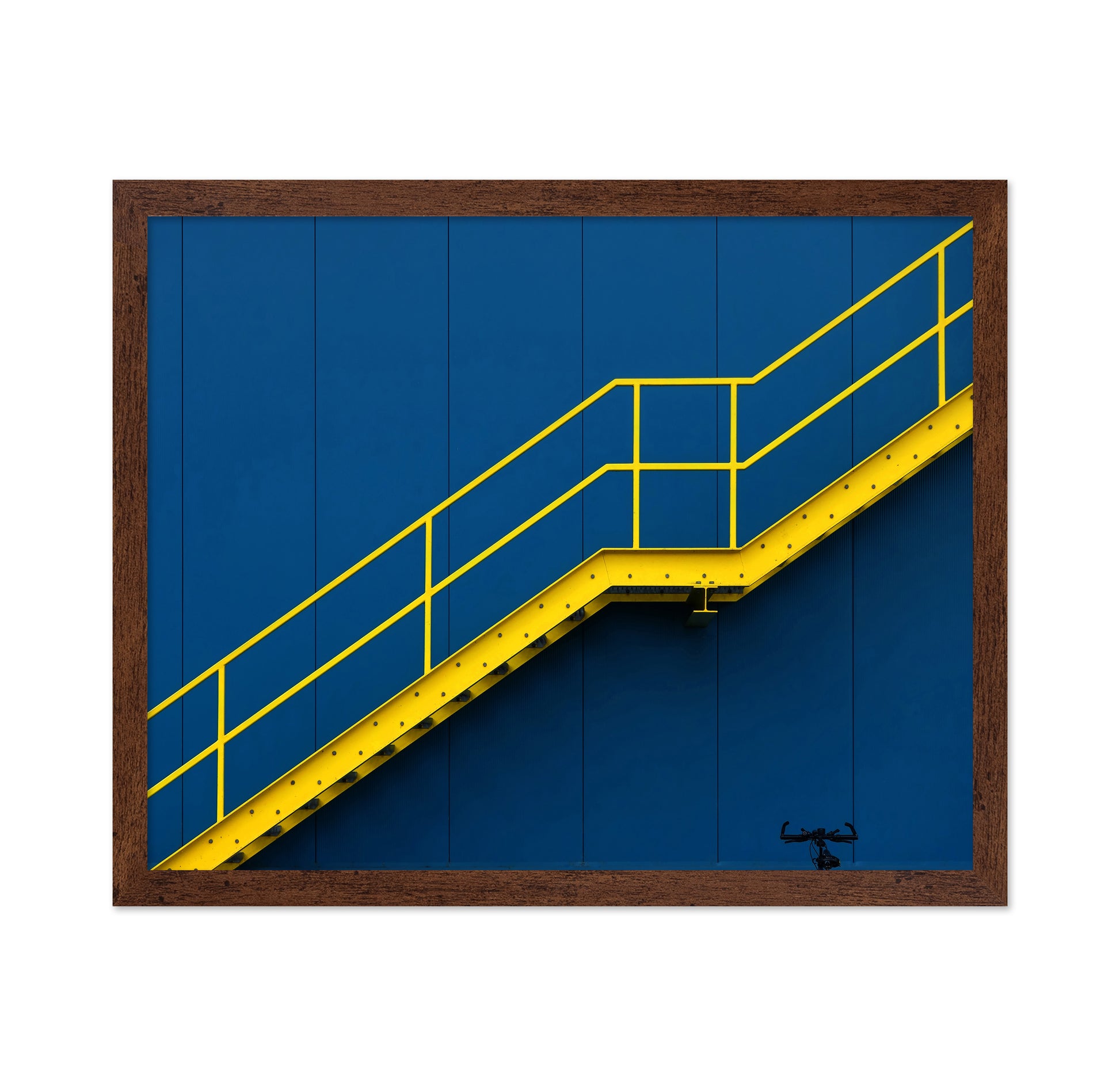 Yellow Metal Staircase Against A Blue