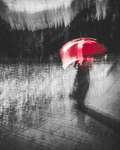 Red Umbrella in Urban Blur