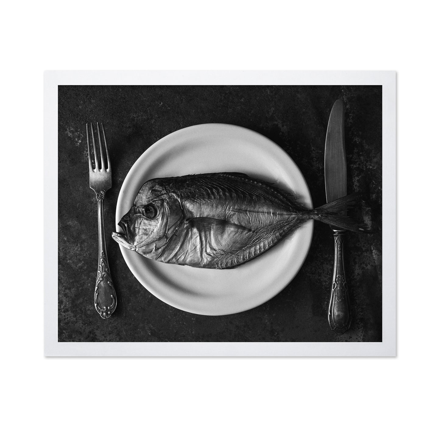 Fish On A Plate With A Fork And Knife