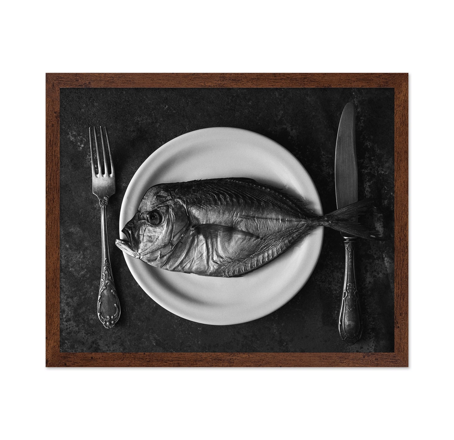 Fish On A Plate With A Fork And Knife