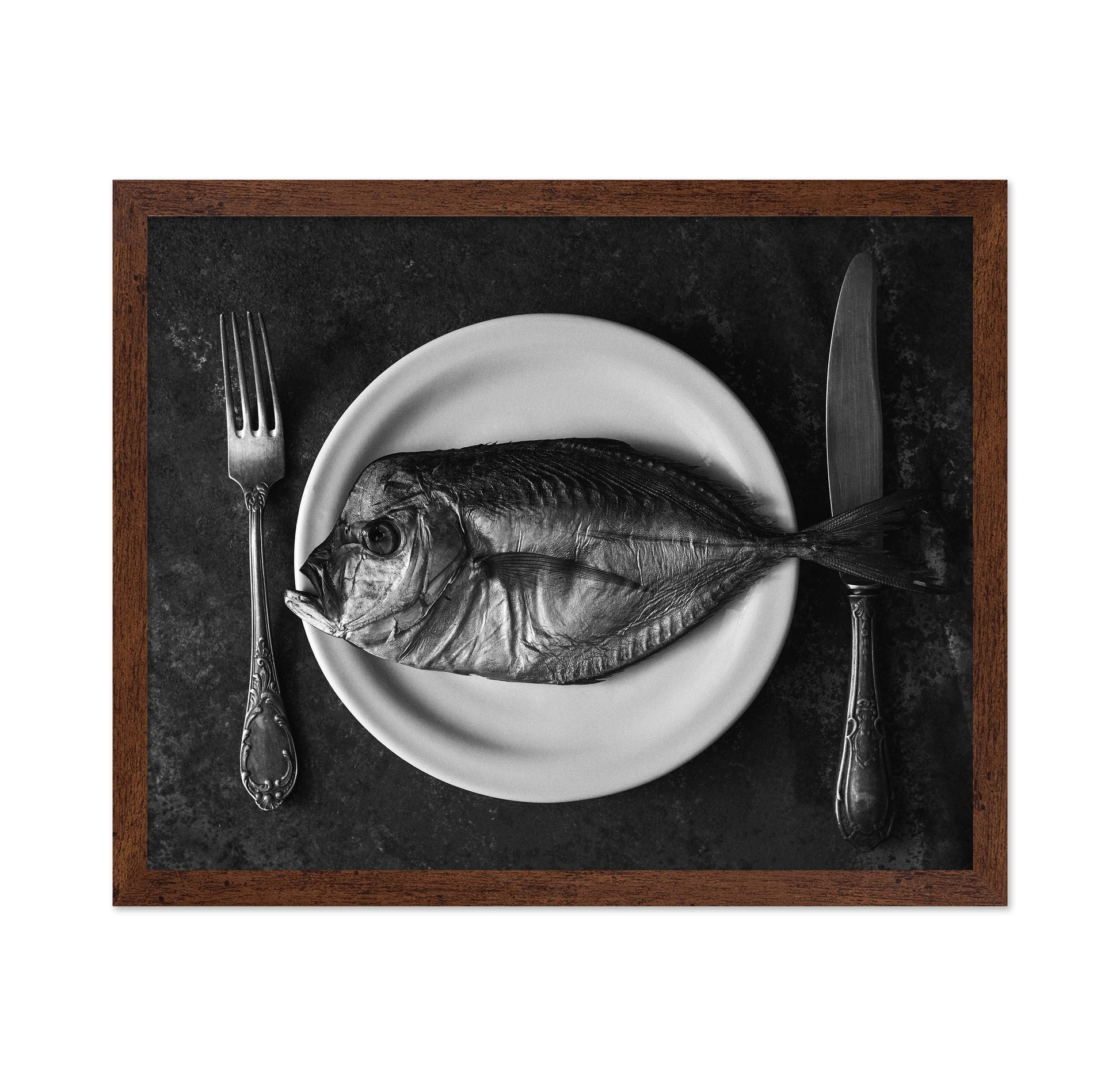 Fish On A Plate With A Fork And Knife