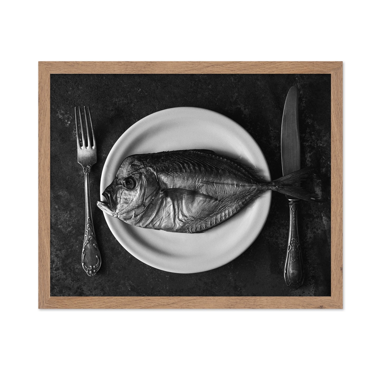 Fish On A Plate With A Fork And Knife