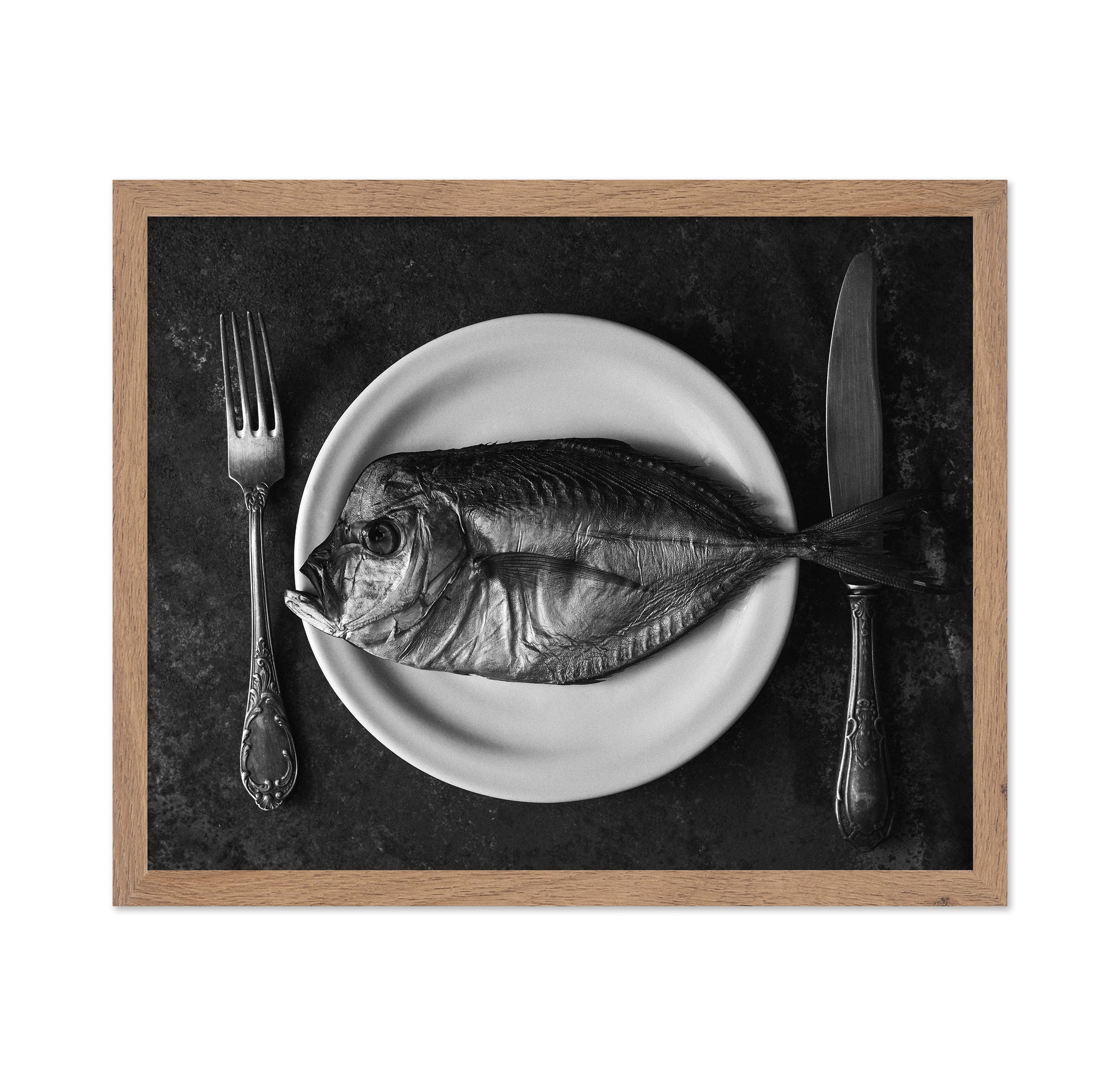Fish On A Plate With A Fork And Knife