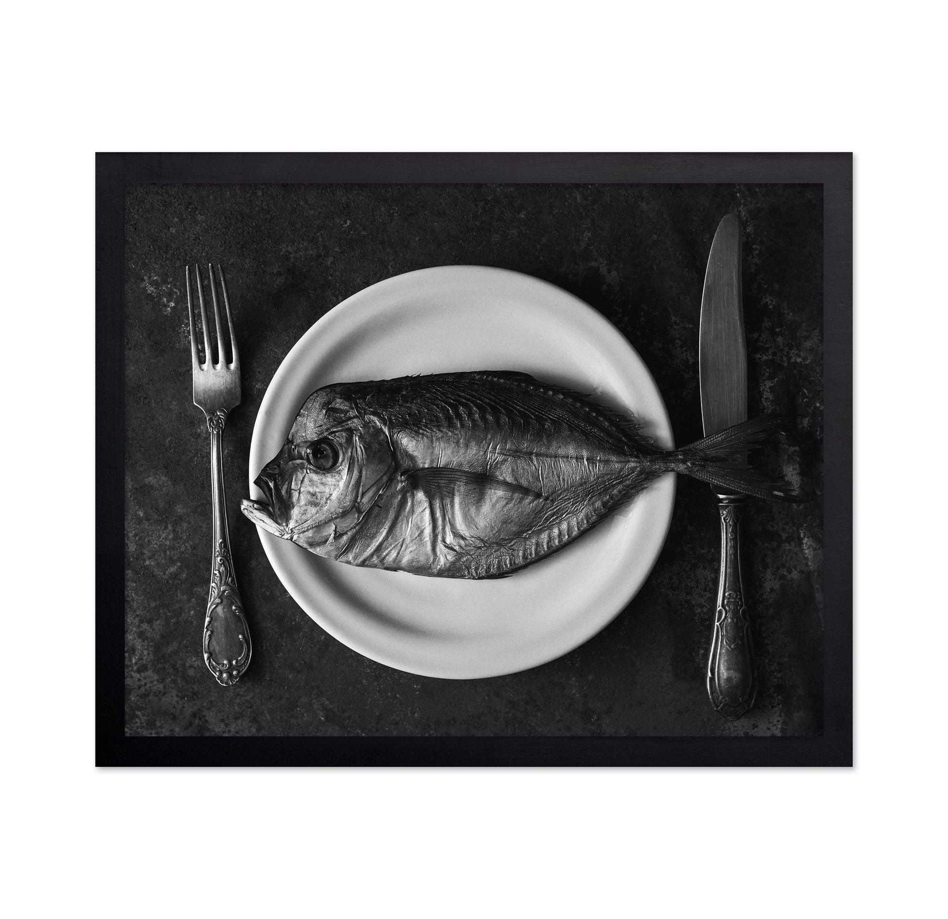 Fish On A Plate With A Fork And Knife