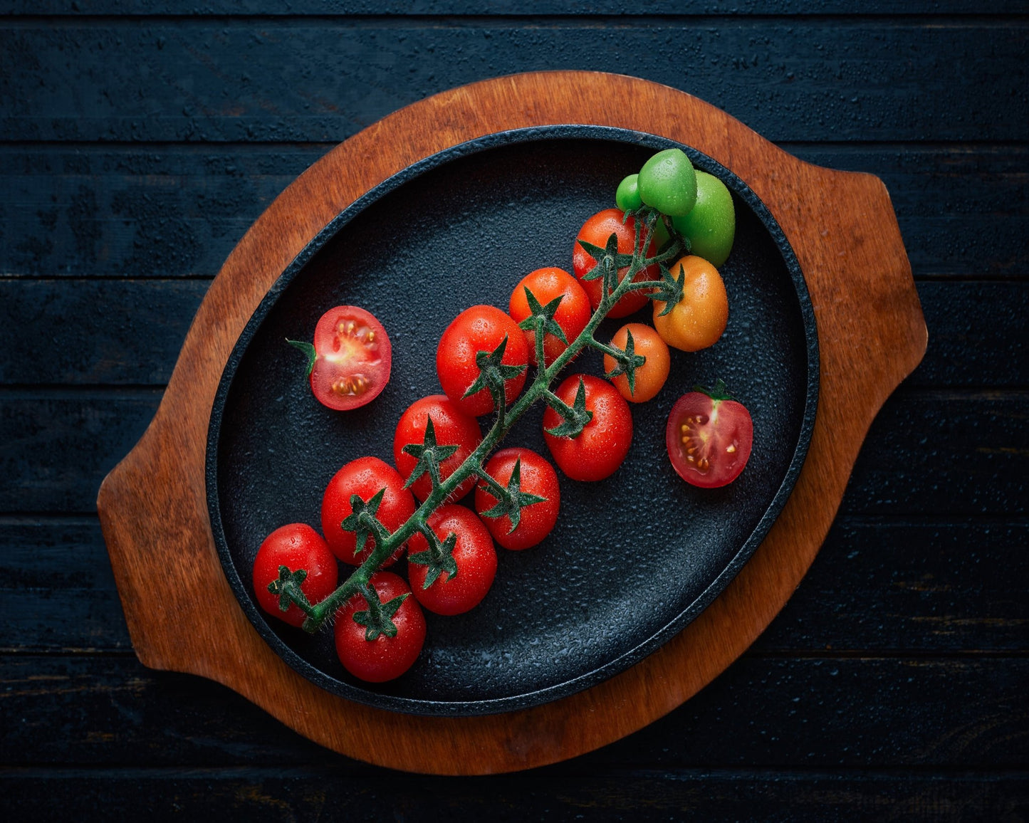 Cherry Tomatoes Arranged On A Vine