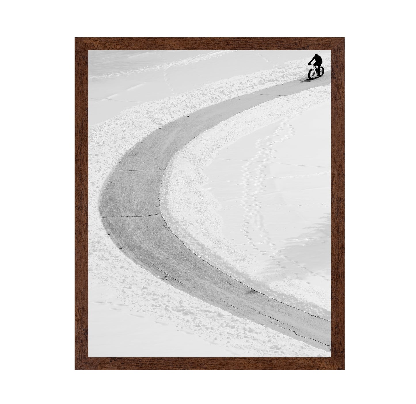 Lone Cyclist in Snow