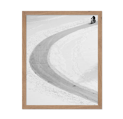 Lone Cyclist in Snow